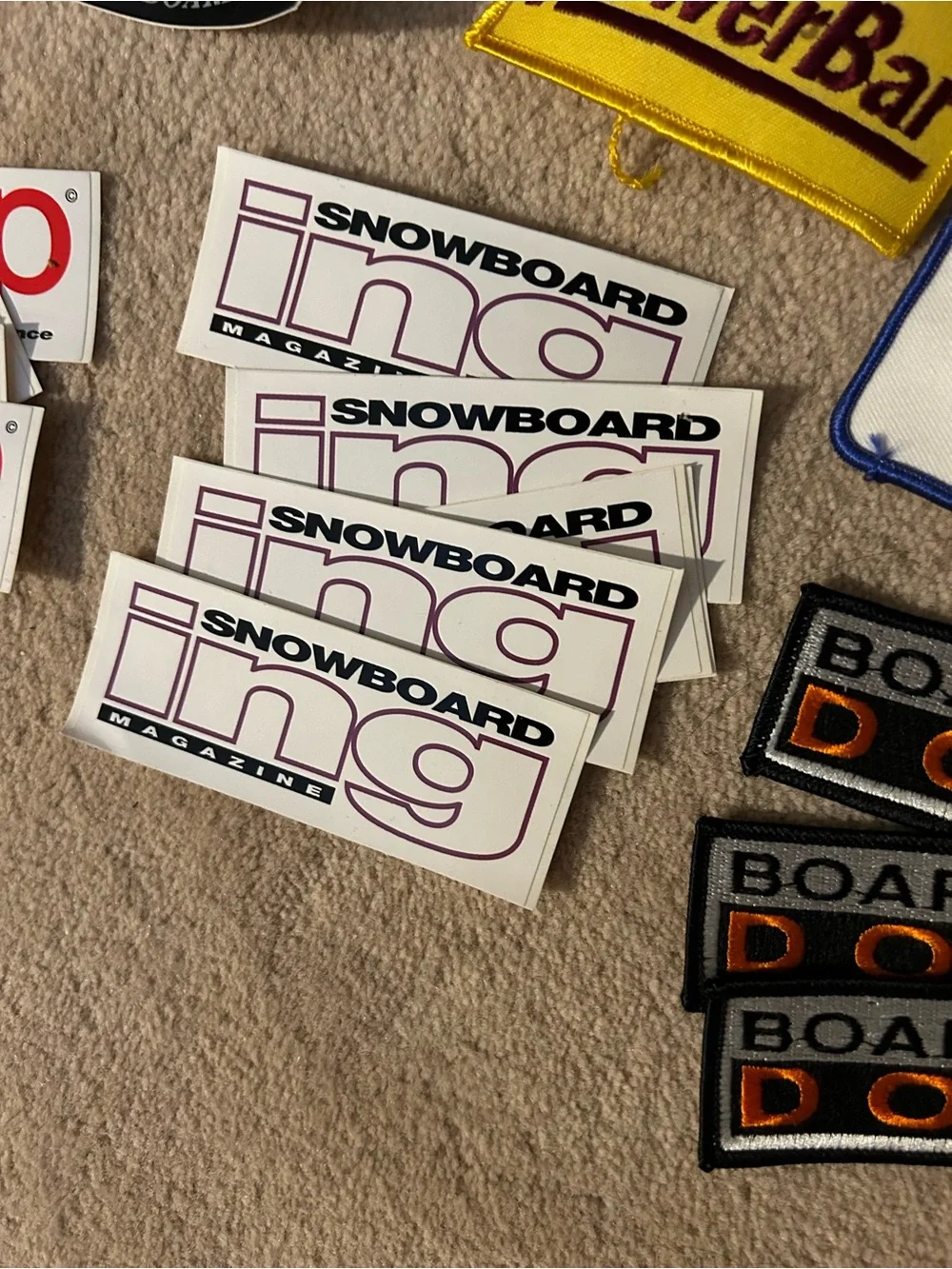 Snowboard patches and stickers. Multiple adv.